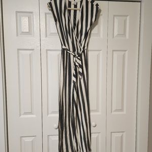 Caution to the Wind jumpsuit. V neck, tie front. Size small.